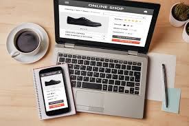 E-commerce marketing dashboard on laptop and mobile showing online store performance, product listings, and digital sales analytics